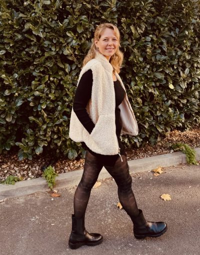 Anne walking after giving birth, wearing compression stockings 