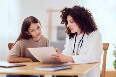 female patient consulting with female doctor